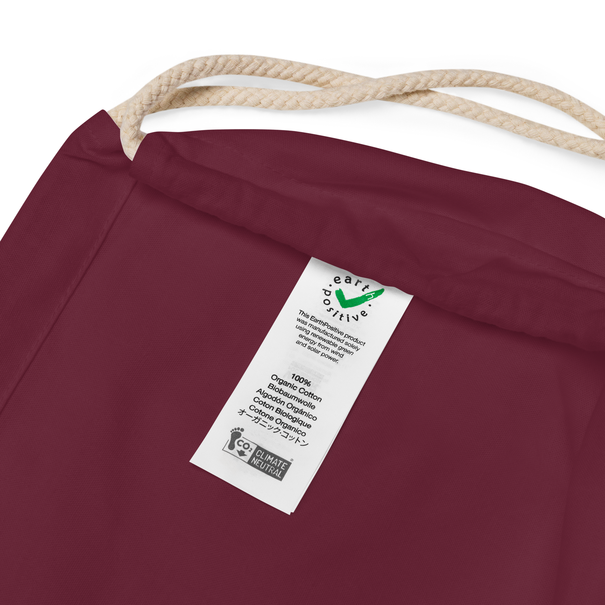 Inside label of Neurodiversity Rainbow Infinity EarthPositive Cotton Drawstring Bag in Burgundy